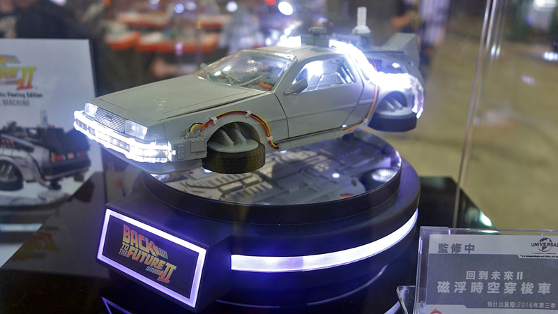 Illustration for article titled Miniature BTTF IIÂ Hoverboard and DeLorean Toys That Really Float
